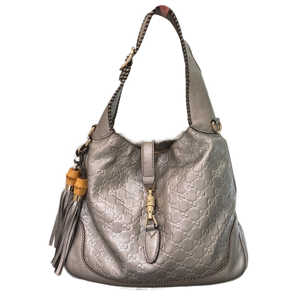 ISO: Gucci  Silver Jackie Satchel